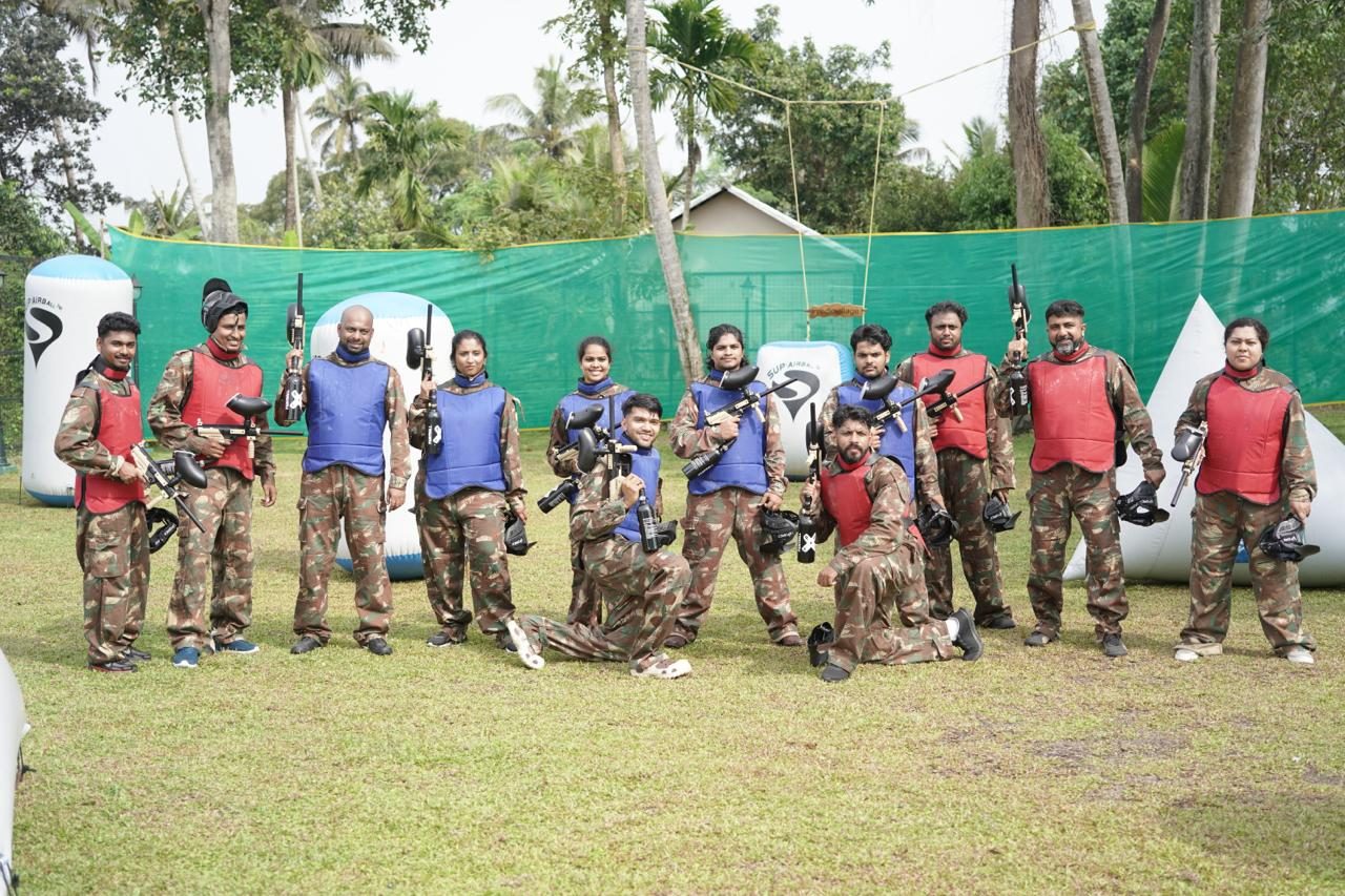 The team lined up on the paintball field